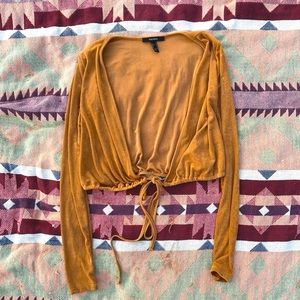 Women’s forever 21 champagne wrap around shirt. Size M